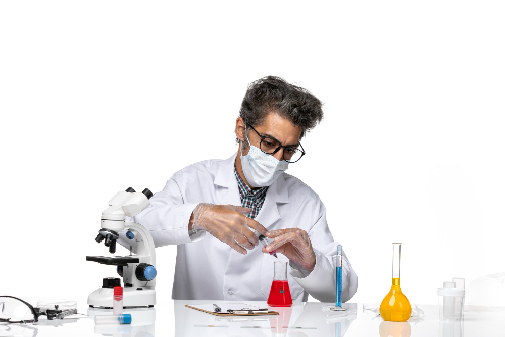 Lab technician pipetting